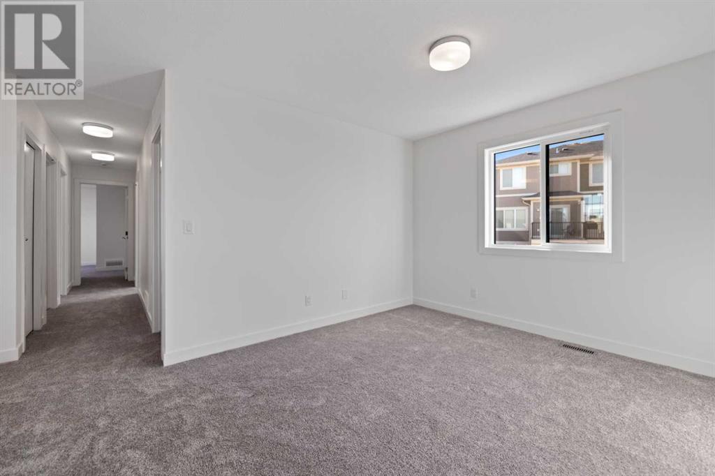 Photo 12 of 648 South Point Heath Sw, Airdrie AB