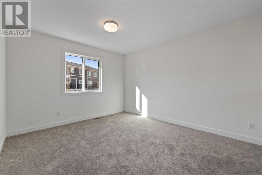 Photo 13 of 648 South Point Heath Sw, Airdrie AB