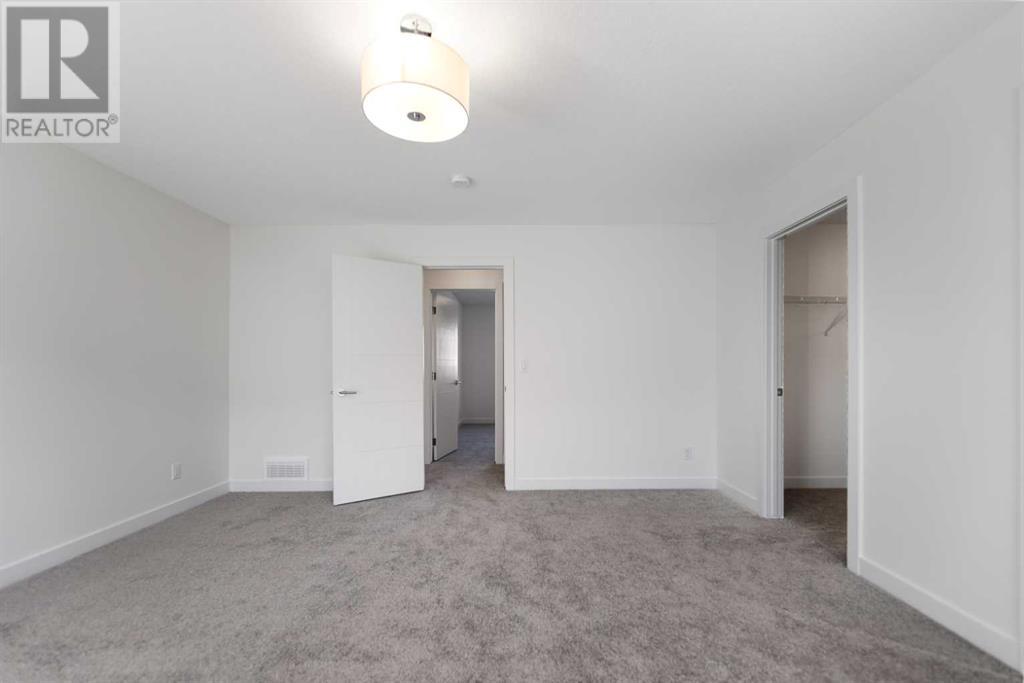 Photo 15 of 648 South Point Heath Sw, Airdrie AB
