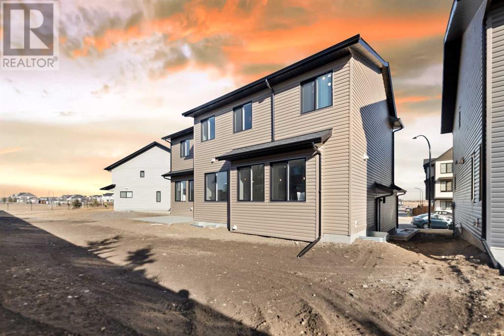 Photo 4 of 648 South Point Heath Sw, Airdrie AB