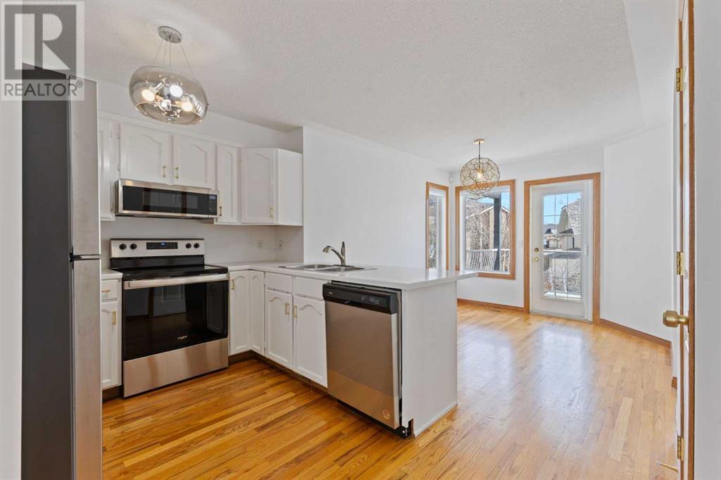Single Family House Bi-level for Sale in  Scurfield Drive NW Scenic Acres Calgary 