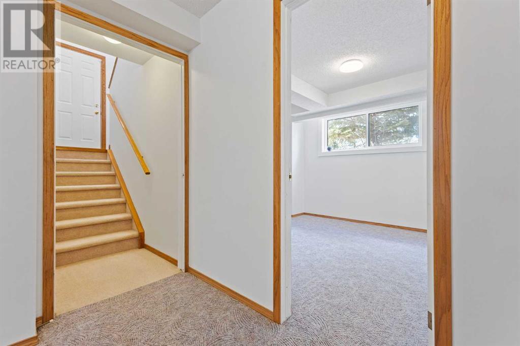 Single Family House Bi-level for Sale in  Scurfield Drive NW Scenic Acres Calgary 