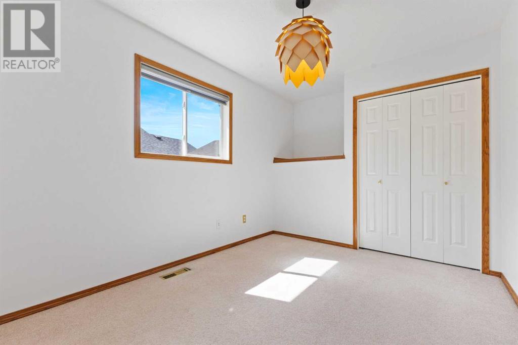 Single Family House Bi-level for Sale in  Scurfield Drive NW Scenic Acres Calgary 