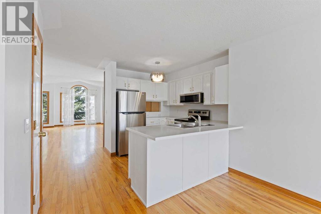 Single Family House Bi-level for Sale in  Scurfield Drive NW Scenic Acres Calgary 