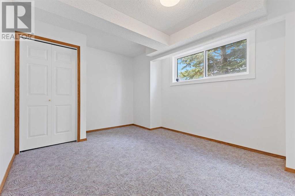Single Family House Bi-level for Sale in  Scurfield Drive NW Scenic Acres Calgary 