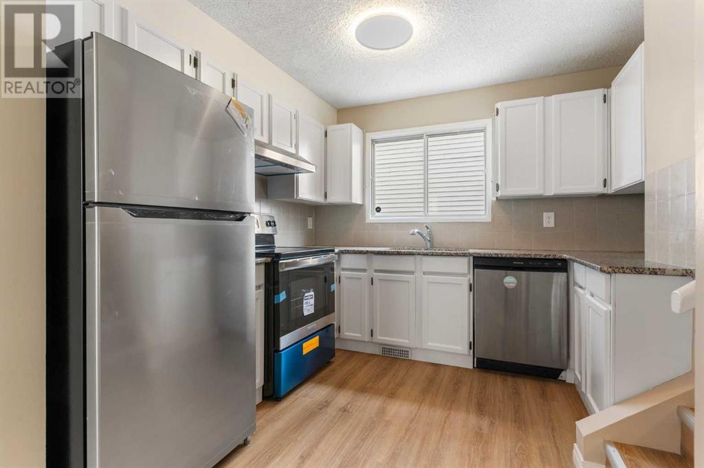 Single Family House 4 Level for Sale in  Sandstone Road NW Sandstone Valley Calgary 