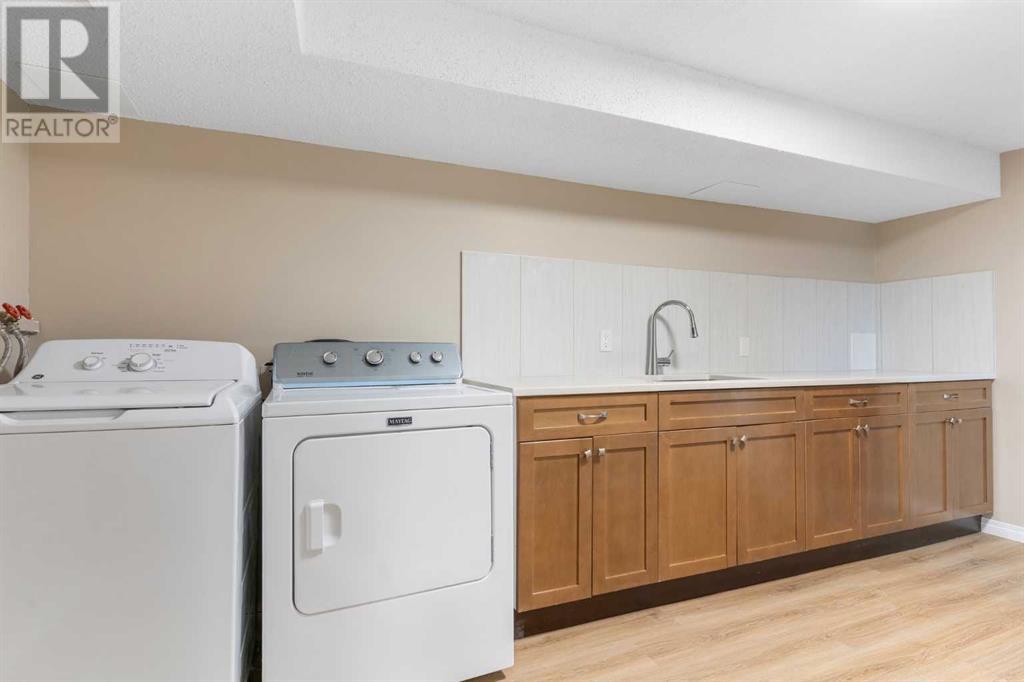 Single Family House 4 Level for Sale in  Sandstone Road NW Sandstone Valley Calgary 