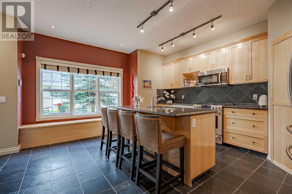 Single Family House for Sale in  Ypres Green SW Garrison Woods Calgary 
