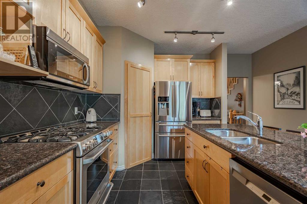 Single Family House for Sale in  Ypres Green SW Garrison Woods Calgary 