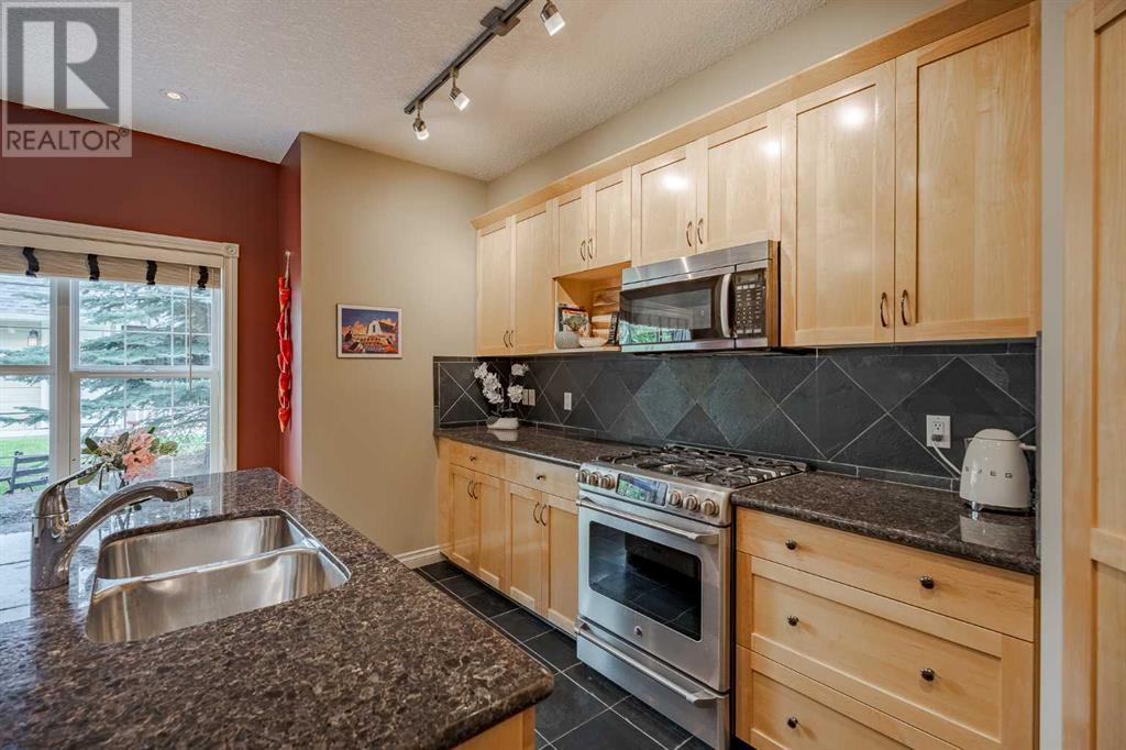 Single Family House for Sale in  Ypres Green SW Garrison Woods Calgary 