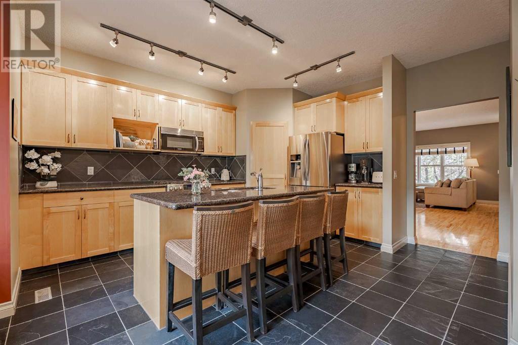 Single Family House for Sale in  Ypres Green SW Garrison Woods Calgary 