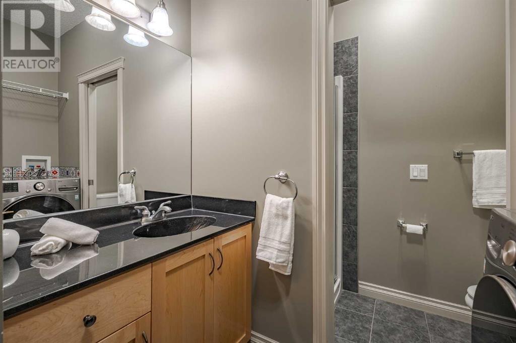Single Family House for Sale in  Ypres Green SW Garrison Woods Calgary 