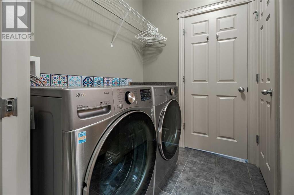 Single Family House for Sale in  Ypres Green SW Garrison Woods Calgary 