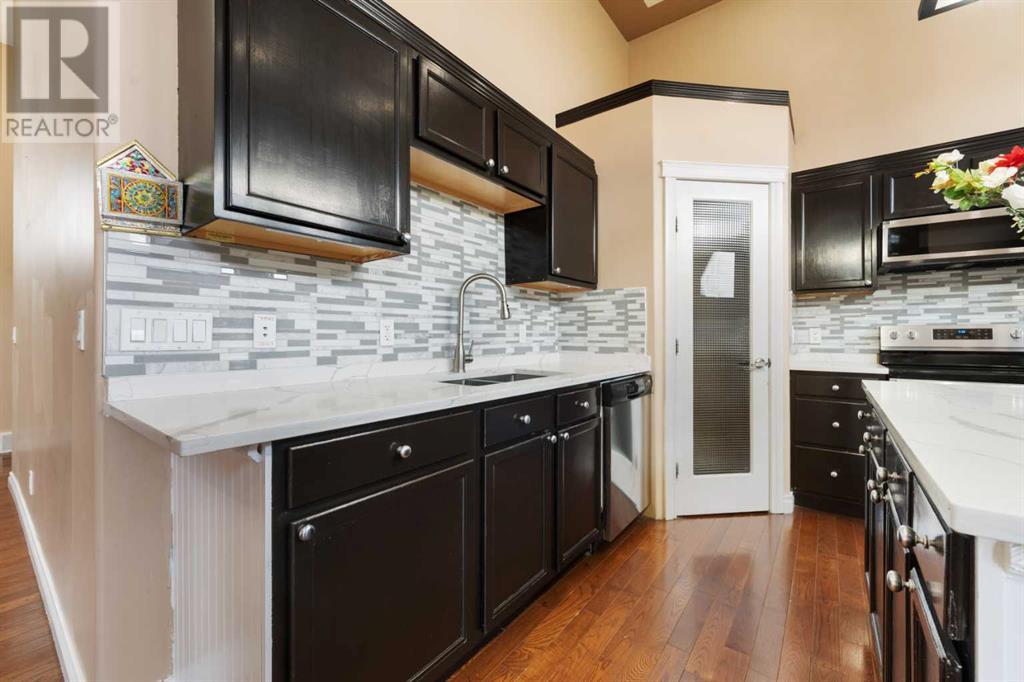 Single Family House Bi-level for Sale in  Tarawood Place NE Taradale Calgary 