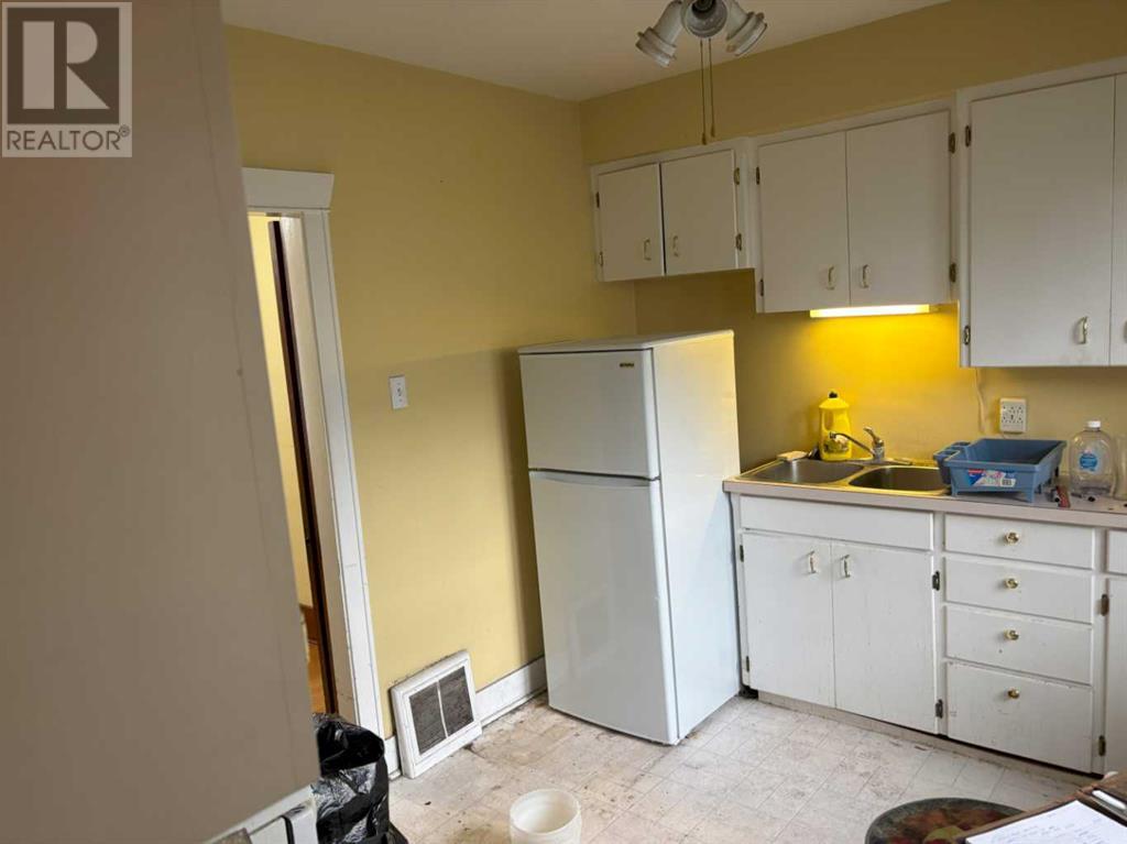 Single Family House Bungalow for Sale in   Avenue NE Crescent Heights Calgary 
