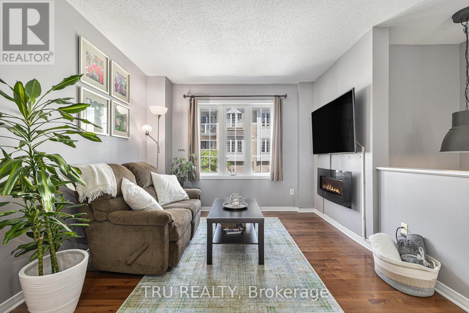 Bright open living area with fireplace