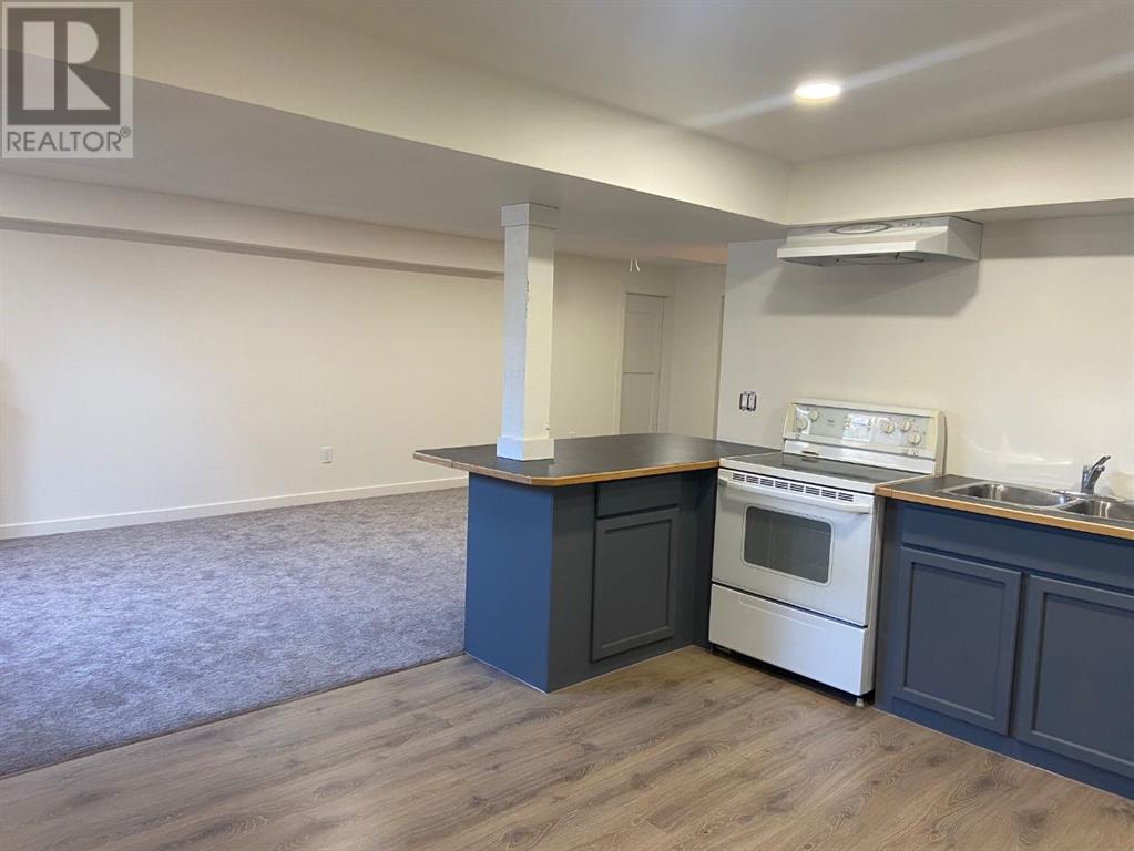 Single Family House for Sale in  b Avenue S Victoria Park Lethbridge 