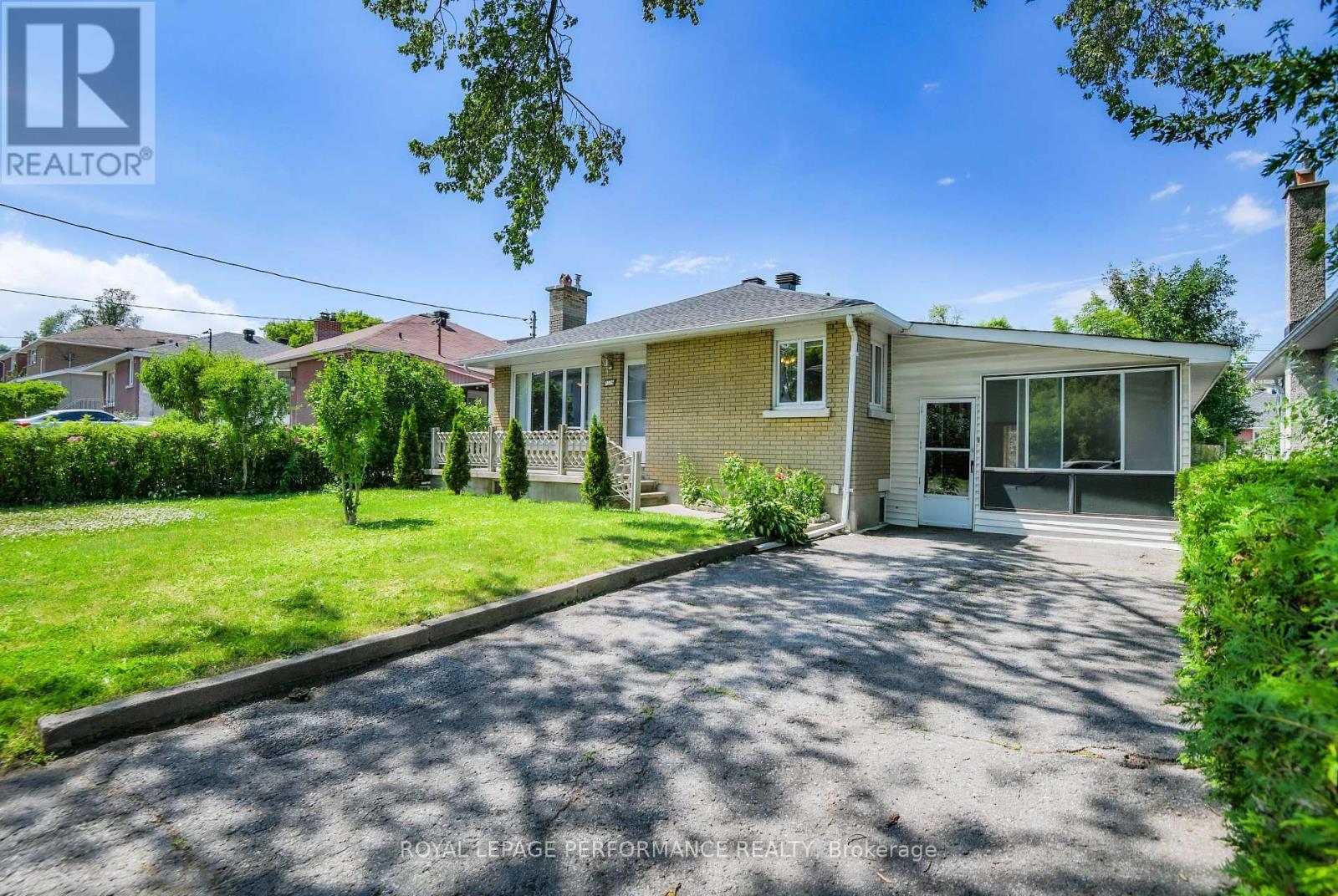 Enclosed carport and private driveway