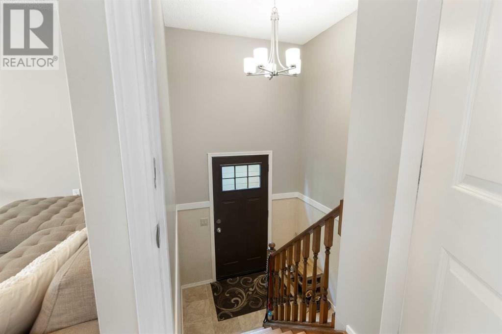 Single Family House Bi-level for Sale in  Sandstone Place NW Sandstone Valley Calgary 
