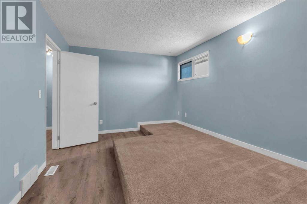 Single Family House for Sale in  Pinemill Mews NE Pineridge Calgary 