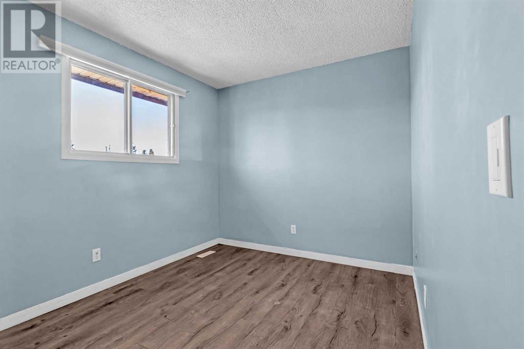 Single Family House for Sale in  Pinemill Mews NE Pineridge Calgary 