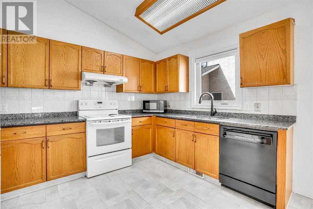 Single Family House 4 Level for Sale in  Del Monica Place NE Monterey Park Calgary 