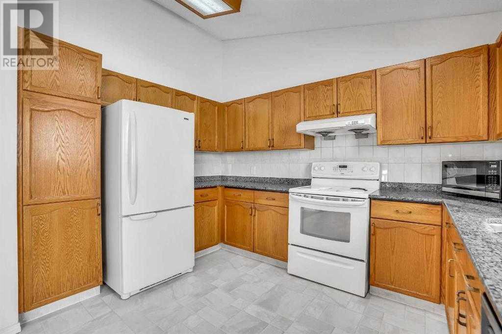 Single Family House 4 Level for Sale in  Del Monica Place NE Monterey Park Calgary 