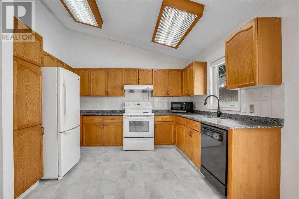 Single Family House 4 Level for Sale in  Del Monica Place NE Monterey Park Calgary 
