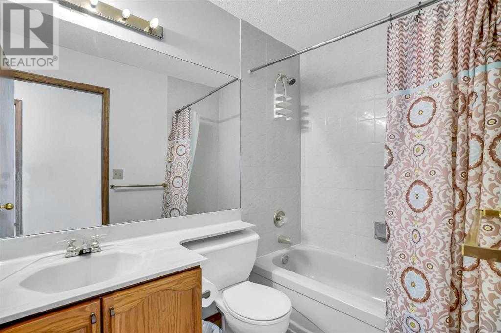 Single Family House 4 Level for Sale in  Del Monica Place NE Monterey Park Calgary 
