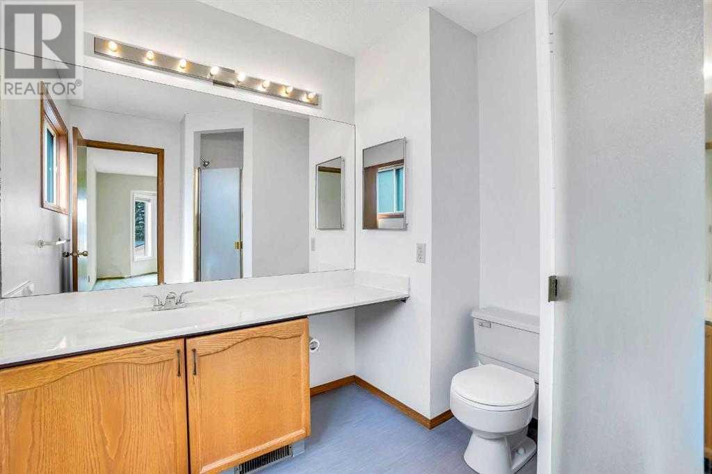 Single Family House 4 Level for Sale in  Del Monica Place NE Monterey Park Calgary 