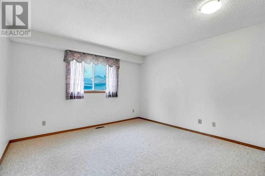 Single Family House 4 Level for Sale in  Del Monica Place NE Monterey Park Calgary 