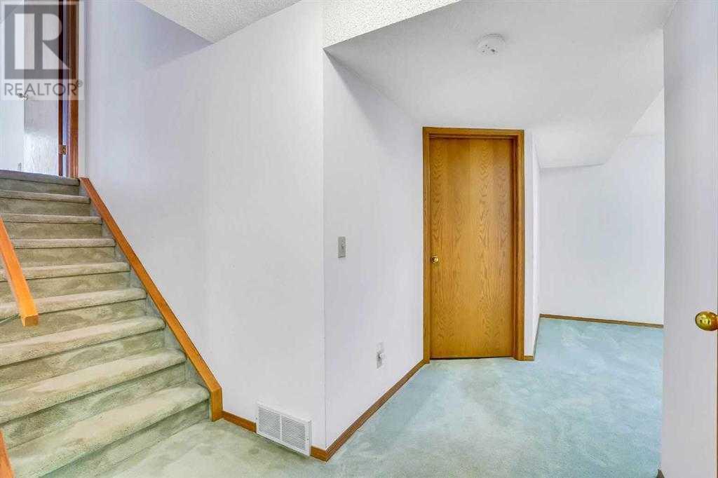 Single Family House 4 Level for Sale in  Del Monica Place NE Monterey Park Calgary 