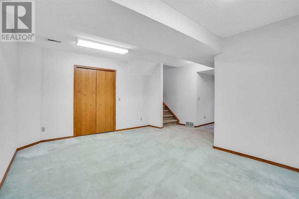 Single Family House 4 Level for Sale in  Del Monica Place NE Monterey Park Calgary 