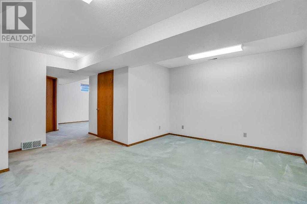 Single Family House 4 Level for Sale in  Del Monica Place NE Monterey Park Calgary 