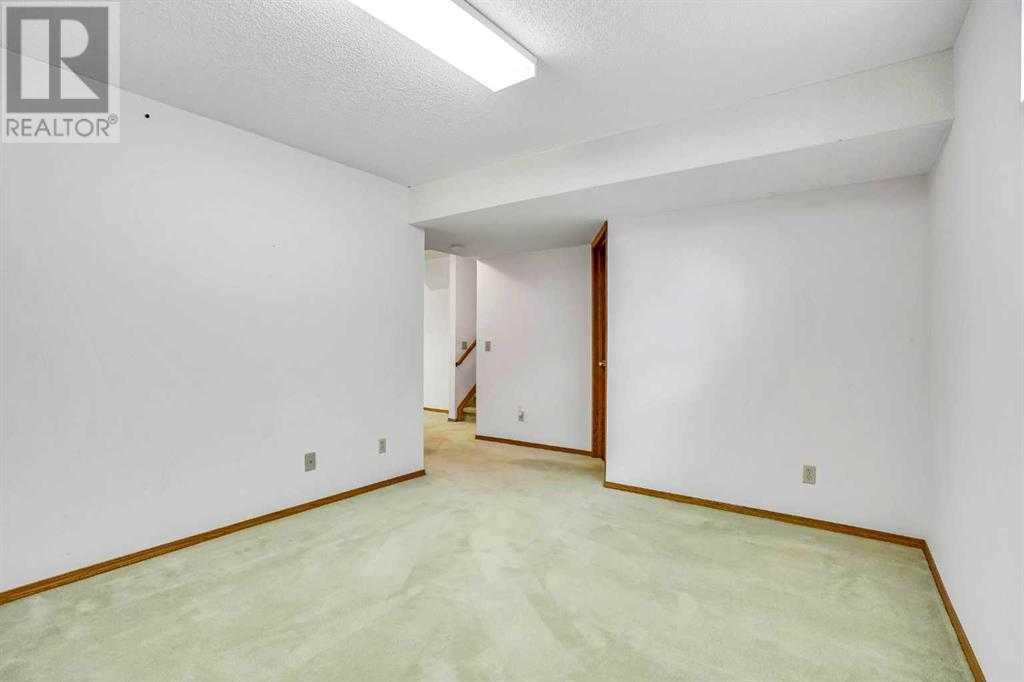 Single Family House 4 Level for Sale in  Del Monica Place NE Monterey Park Calgary 