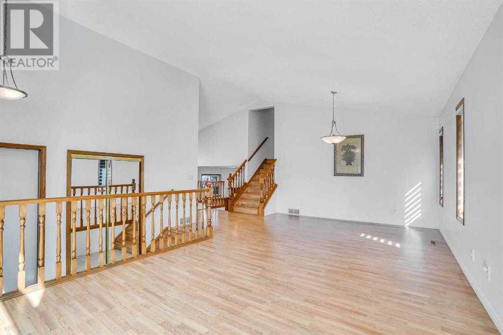 Single Family House 4 Level for Sale in  Del Monica Place NE Monterey Park Calgary 