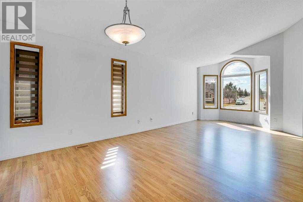 Single Family House 4 Level for Sale in  Del Monica Place NE Monterey Park Calgary 