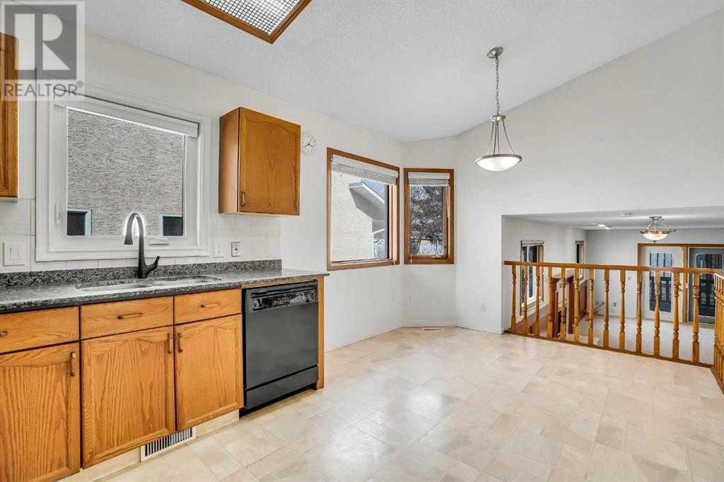 Single Family House 4 Level for Sale in  Del Monica Place NE Monterey Park Calgary 