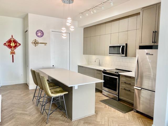 Photo 4 of 103 17578 57 A Avenue, Surrey BC