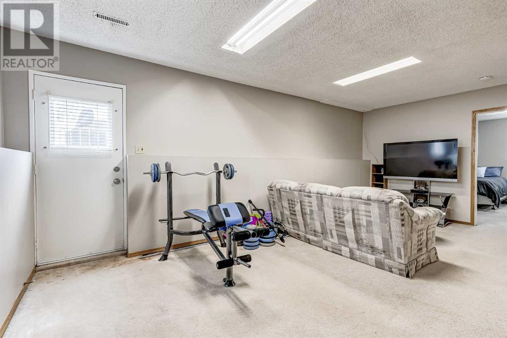 Single Family House Bi-level for Sale in  Woodmont Way SW Woodbine Calgary 