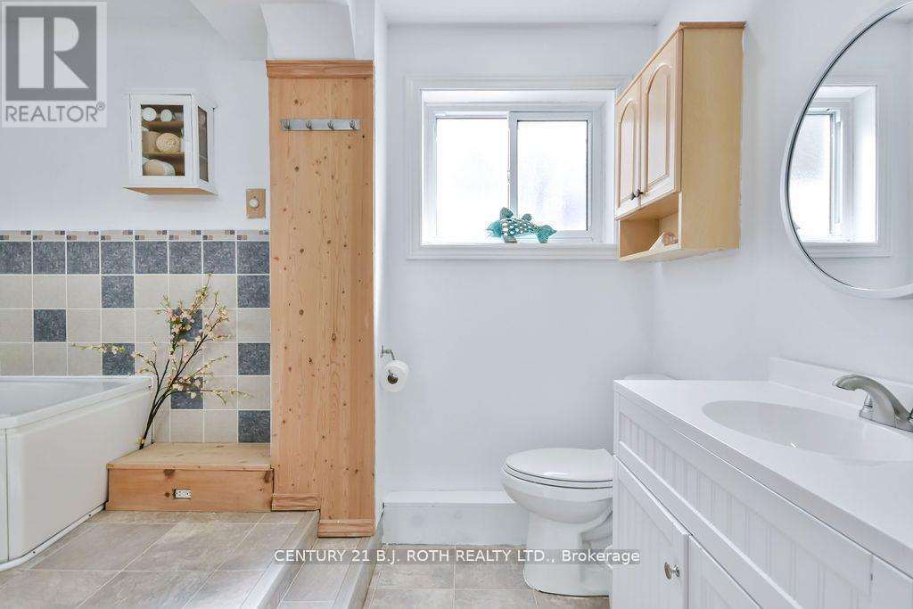 Photo 3 of 21 Luella Boulevard, Springwater ON
