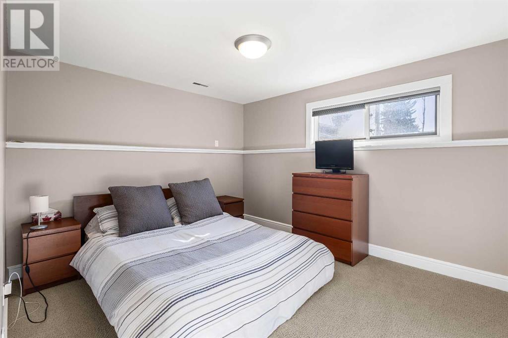Single Family House 4 Level for Sale in  Lake Rosen Crescent SE Lake Bonavista Calgary 