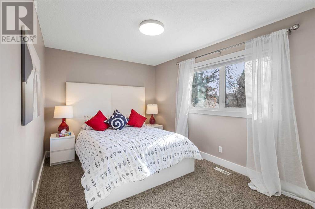 Single Family House 4 Level for Sale in  Lake Rosen Crescent SE Lake Bonavista Calgary 