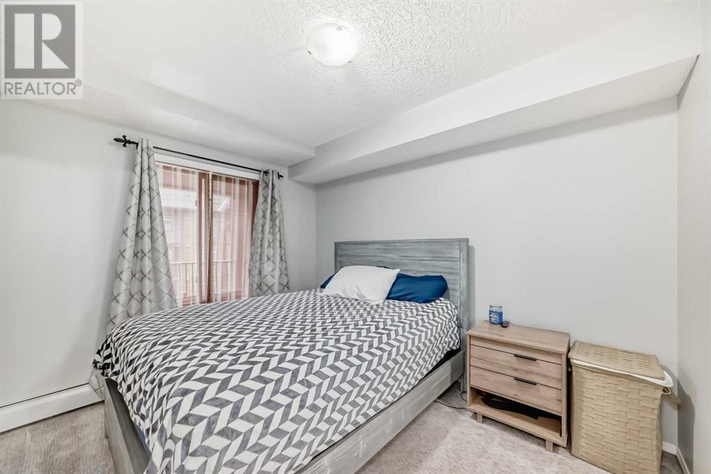 Photo 11 of 1305 403 Mackenzie Way Sw, Airdrie AB