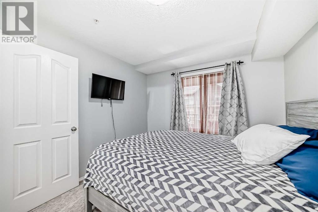 Photo 12 of 1305 403 Mackenzie Way Sw, Airdrie AB