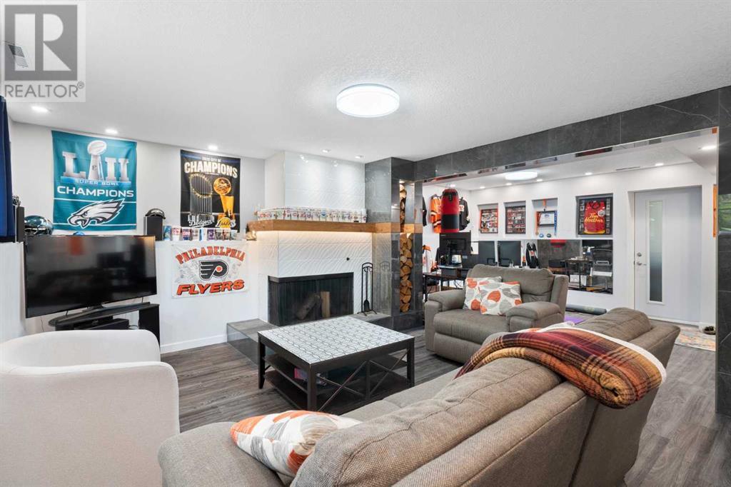 Single Family House Bi-level for Sale in  Bearspaw Drive NW Brentwood Calgary 