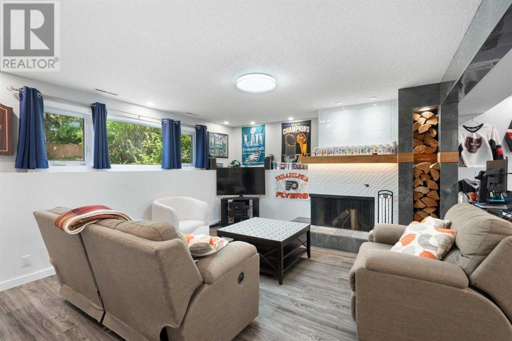 Single Family House Bi-level for Sale in  Bearspaw Drive NW Brentwood Calgary 