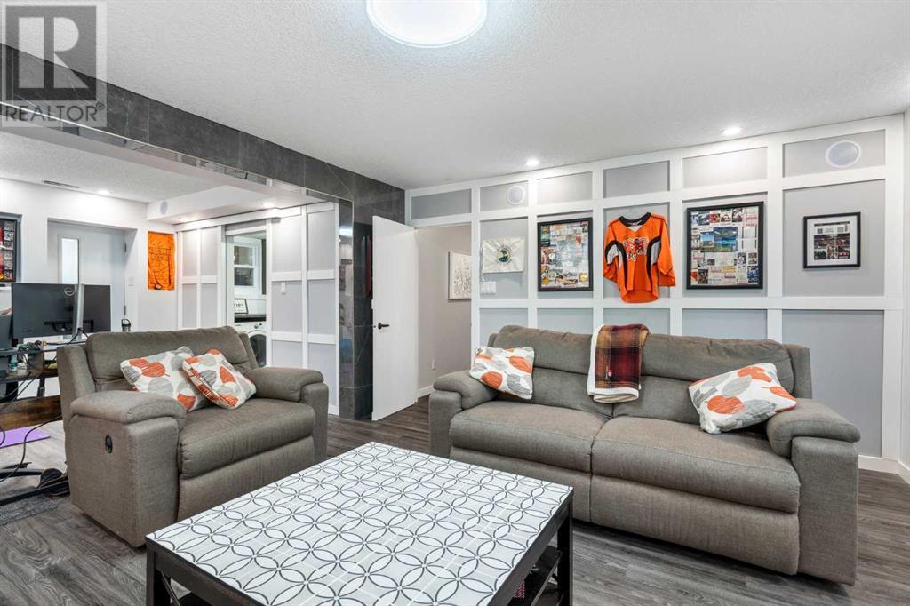 Single Family House Bi-level for Sale in  Bearspaw Drive NW Brentwood Calgary 