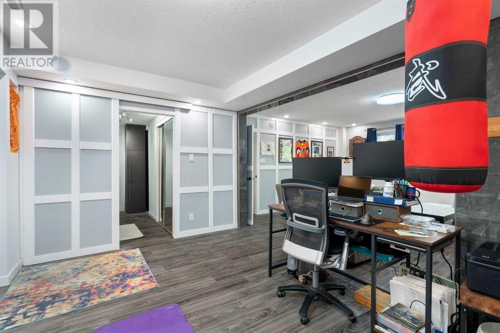 Single Family House Bi-level for Sale in  Bearspaw Drive NW Brentwood Calgary 