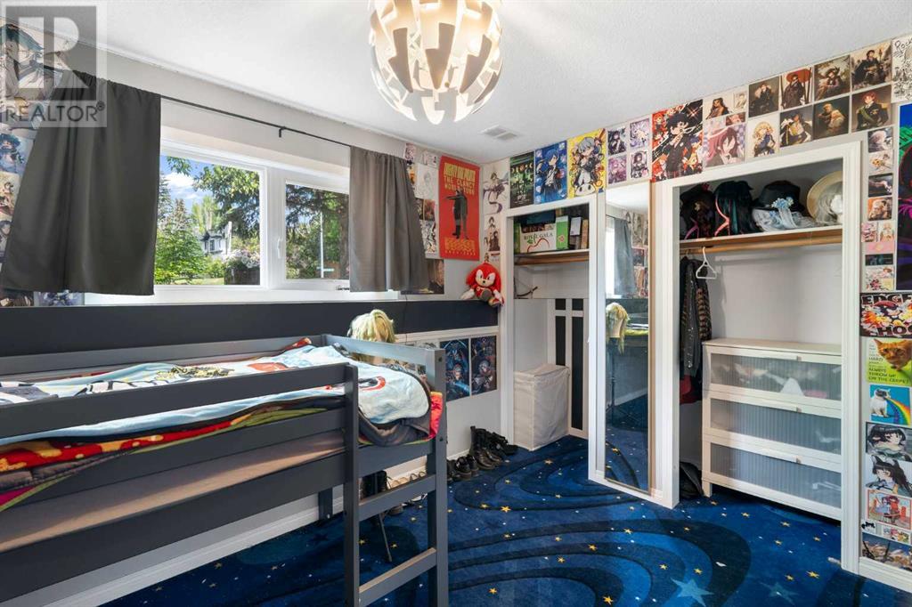 Single Family House Bi-level for Sale in  Bearspaw Drive NW Brentwood Calgary 